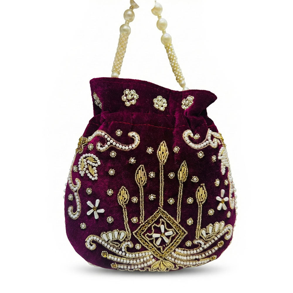 Decorative purple handbag with gold embroidery 